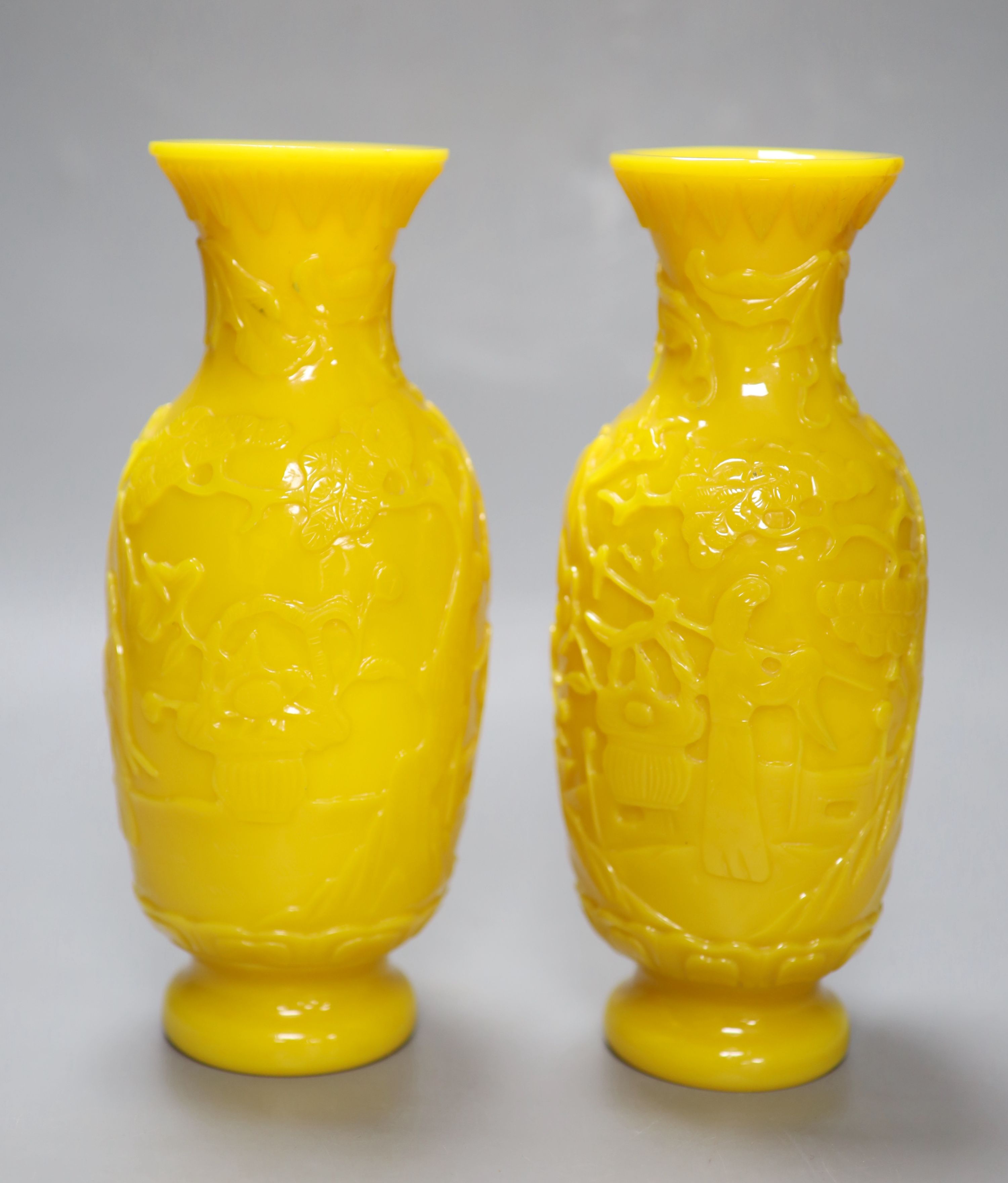 A pair of Chinese Beijing yellow glass vases, c.1900, height 21.5cm